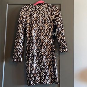 LONG SLEEVE SEQUIN BODY CON DRESS.